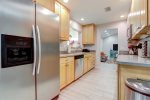 Airy kitchen offers utmost cooking space for the family chef